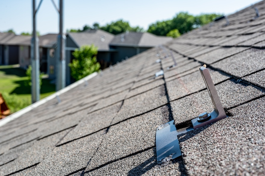 Close-up of asphalt shingle installation on a Central Florida home