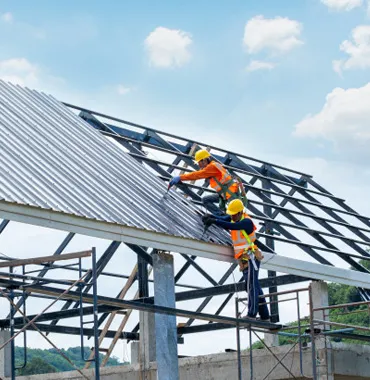 Roofing crew installing a new roof in Central Florida — Blitz Roofing & Construction